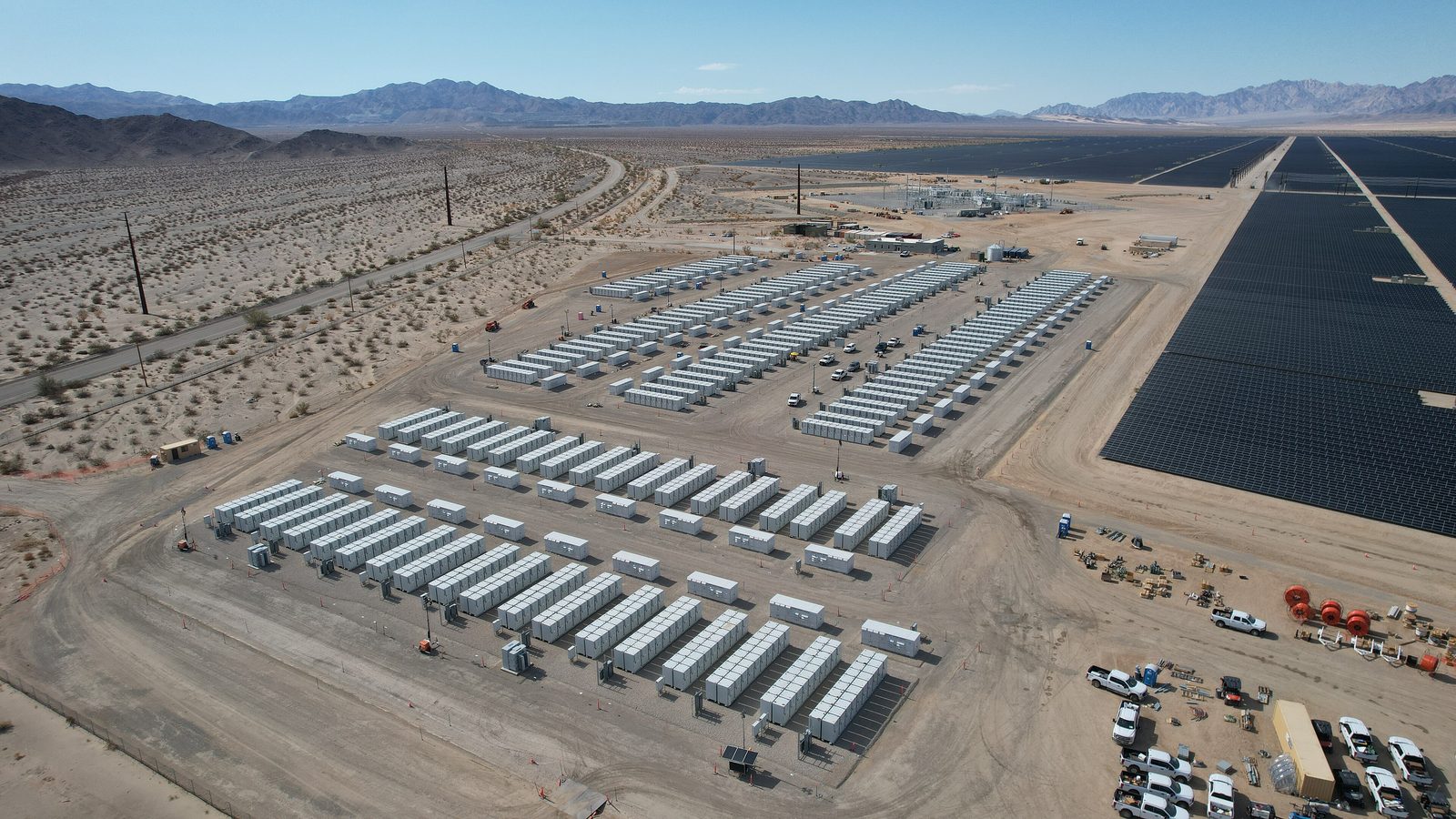 Grid scale battery energy storage system alongside a solar farm in the desert